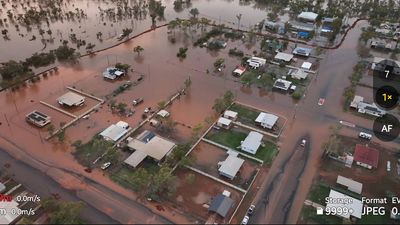 'Just too much water': town flooded after levee breaks