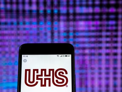 Is Universal Health Stock Underperforming the Dow?