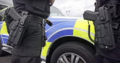 Armed police descend on property as homes evacuated
