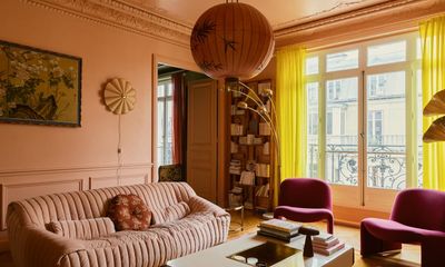 Floating away: warm tones and vintage details lift the spirits in a grand Parisian apartment