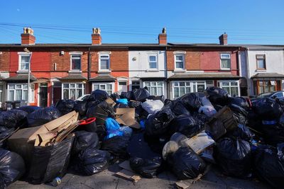 Garbage piles up on Birmingham's streets as a sanitation strike in the UK city enters its 5th week