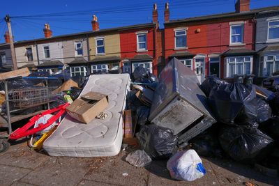 Blind Birmingham resident fears for safety as bin strike rubbish piles break walking cane
