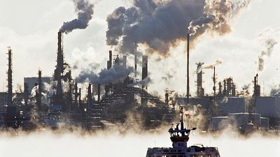 Oil prices tumble to four-year low as US-China trade war fuels recession fears
