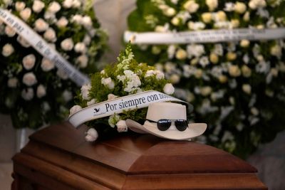 Mourners pay tribute to merengue icon Rubby Pérez, who died in the Dominican roof collapse
