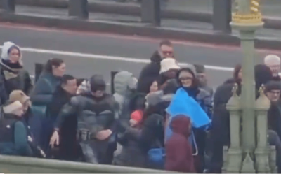 Police disguise as Batman and Robin to snare rogue street traders on Westminster Bridge - watch the video