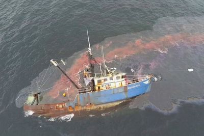 3 rescued and fuel spilled from fishing boat stuck in Boston Harbor