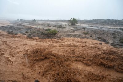 Flood water and thick mud flow through Lanzarote streets as state of emergency declared