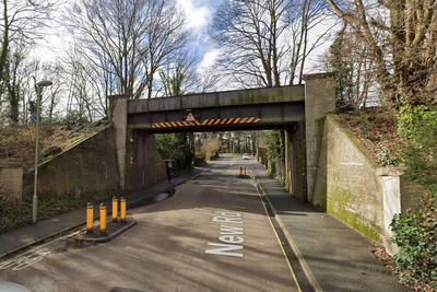 Police probe after ‘life-like’ mannequin hung from bridge with hands tied and bag over its head