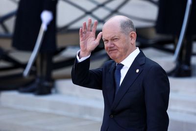 German man fined for hugging Chancellor Olaf Scholz at airport