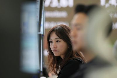 Asian shares fall after a quiet day on Wall St, but Nvidia hit by US ban on exporting AI chip