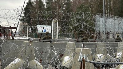 Two bodies believed to be migrants retrieved from river on Poland-Belarus border