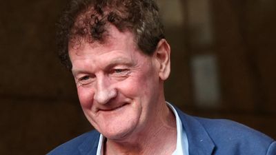 Ex-AFL player agent charged over alleged police threats