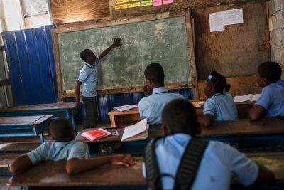 France's president says that making Haiti pay for its independence was unjust