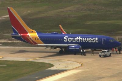 Passengers on Southwest flight evacuated after engine fire forces plane's return