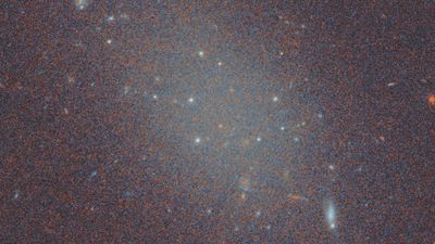 Ghostly galaxy without dark matter baffles astronomers