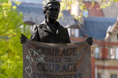 Statue of suffragette Millicent Fawcett defaced as trans rights protesters march on London
