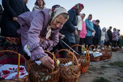 Zelensky accuses Russia of breaking Putin’s ‘truce’ as Ukrainians gather together to mark Easter