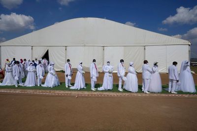 South African church marks Easter with mass weddings for a staggering 3,000 people