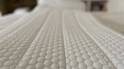 My mattress was too firm and too hot until I invested in the Soak&Sleep Topper