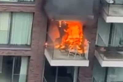 Fire at block of flats tackled by 100 firefighters