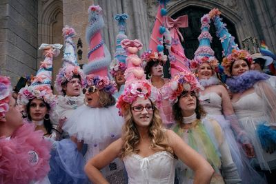 AP PHOTOS: Colorful hats and costumes light up annual NYC Easter Parade