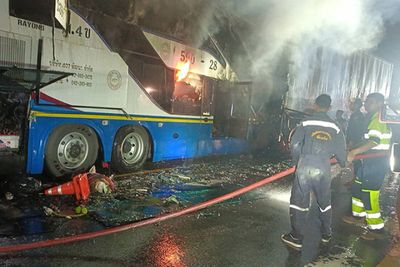 Seven killed when tour bus crashes, catches fire