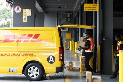 DHL will now suspend consumer shipments ‘from any origin’ that are over $800 because of a tariff-induced backlog at U.S. customs