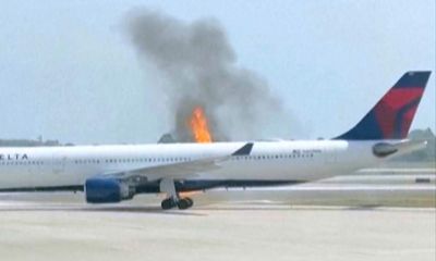 Passengers evacuate Delta plane after engine catches fire at Florida airport