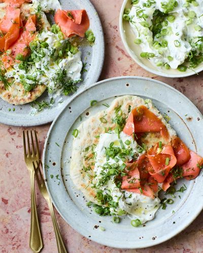 Georgina Hayden’s recipe for spring onion flatbreads with smoked salmon