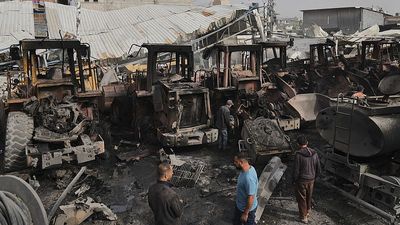 Israeli strikes on Gaza kill at least 14 and destroy bulldozers need to clear rubble