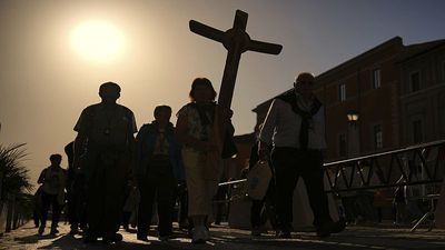 Mourners await the Pope's funeral and future of the Catholic Church