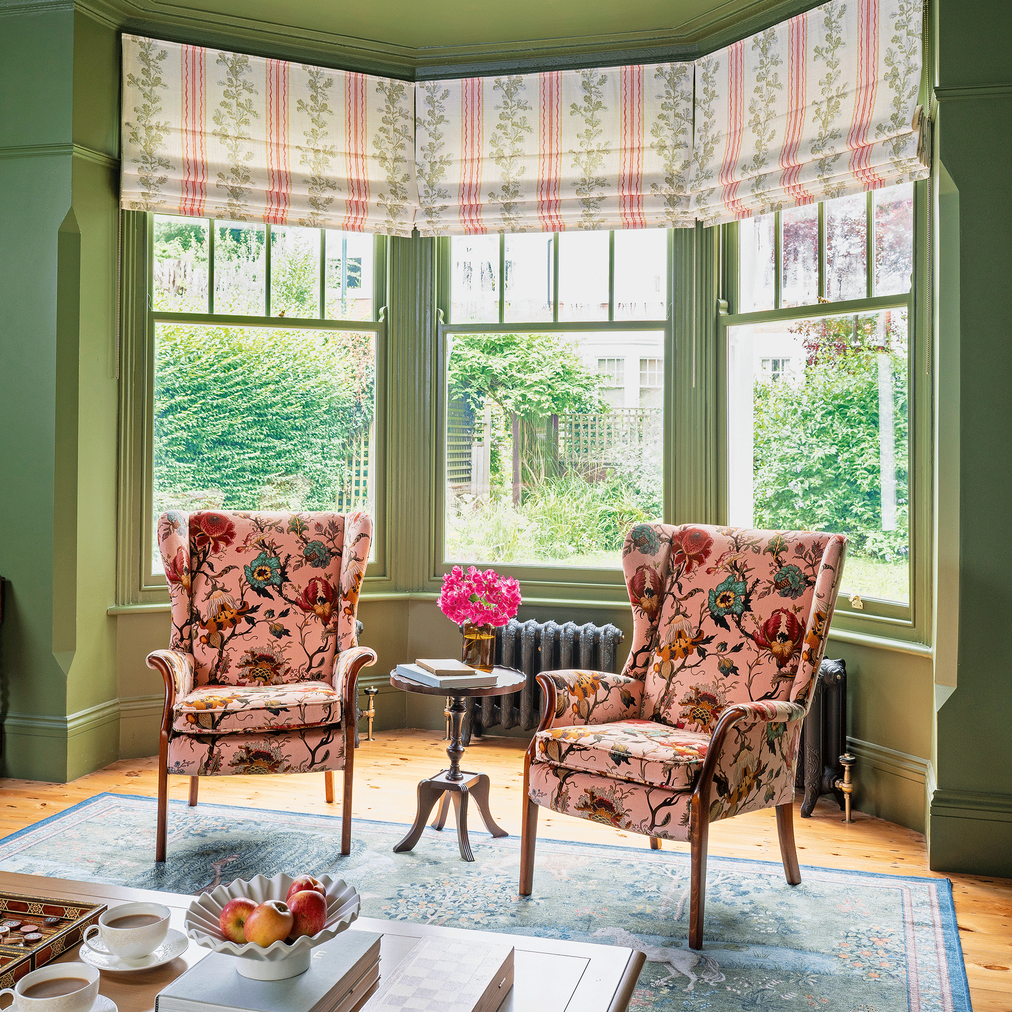 A strict colour palette and vintage finds have turned this semi-detached Edwardian house into an elegant family home
