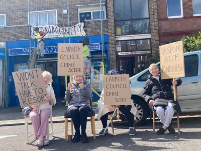 Residents block London street to stop controversial £650,000 plan to replace parking spaces with benches