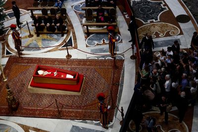 Thousands queue to pay tribute to Pope Francis on first day of lying-in-state