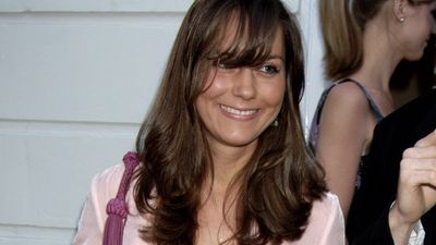Kate Middleton is that you? Her floral dress, side-swept fringe and pink blazer deserve a comeback