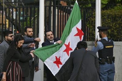 Syrian Foreign Minister Raises New Flag At UN Headquarters