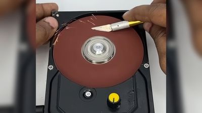 I'm getting major tool envy from this hard drive converted into a variable speed disc sander and I don't care who knows it