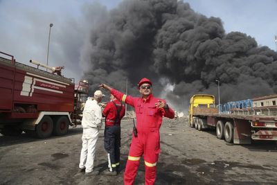 Terrifying explosion linked to missile fuel shipment at key Iranian port kills eight and injures 750