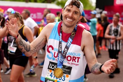 Joel Dommett faints before reaching London Marathon finish line as stars battle 22C heat in gruelling run