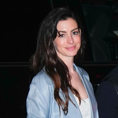 Anne Hathaway Goes Full Princess in a Cinderella Blue Duster Coat for Gigi Hadid's 30th Birthday