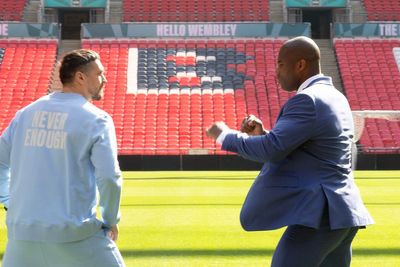 Daniel Dubois pushes Oleksandr Usyk in heated standoff at Wembley as security intervene