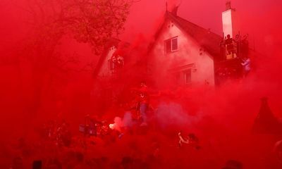 Liverpool back on their perch amid wild scenes and smoke-bomb shenanigans
