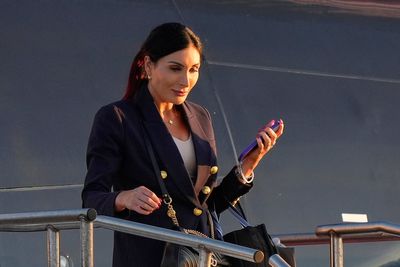 Ex-Justice Department prosecutor challenges his firing by the White House after Laura Loomer post