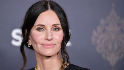 Courteney Cox turns her living room credenza into a deconstructed bookcase – it's an unorthodox way to display books (and simple to replicate)