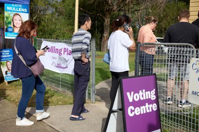 Long drives, chaotic queues: why millions of Australians are casting their votes early