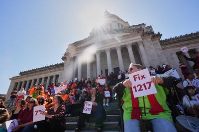 Washington lawmakers pass rent-control bill, approve unemployment for striking workers