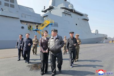 North Korea’s Kim oversees test-firing of missiles from newly launched 5,000-tonne warship
