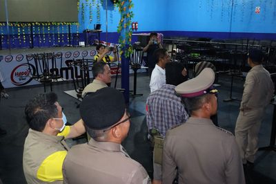 Illegal entertainment venue for migrant workers raided, 'war weapons' found