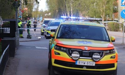 Uppsala attack: police hunt under way after three people shot dead