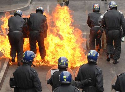 Five Met Police officers facing sack after petrol bombs thrown and car torched at Kent riot training base